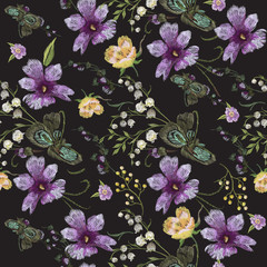 Embroidery floral seamless pattern with ethnic violets. Vector embroidered bouquet with flowers for wearing design.