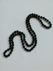 Black beads necklace isolated