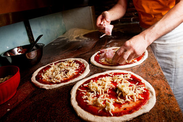 Adding bacon to pizza