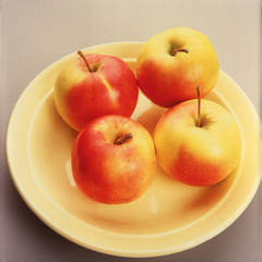 Four ripe and appetizing apple