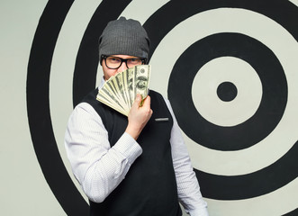 Emotion man with money dollars USA. Man showed 100 dollar bill.