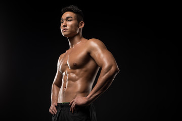 Obraz na płótnie Canvas shirtless muscular asian man