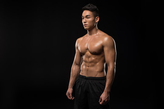 shirtless muscular asian man