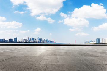 empty marble floor with cityscape of modern city