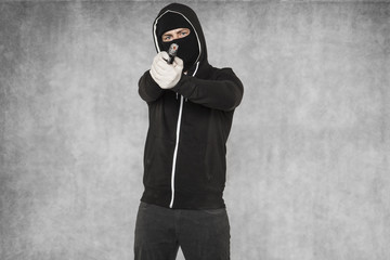 terrorist with arms in his hands