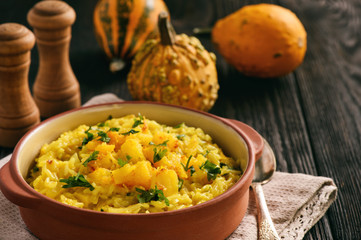 Risotto with pumpkin, cheese and parsley.