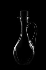 bottle of spiced by a dark background