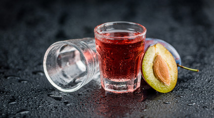 Portion of Plum Liqueur on a slate slab