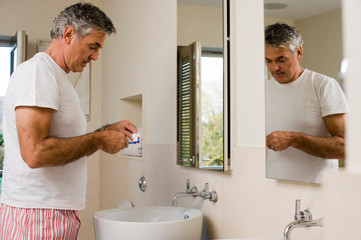 Man about to brush teeth