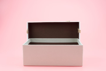 Gift box  on a pink background.