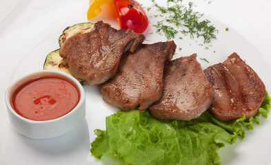 dishes of roast meat