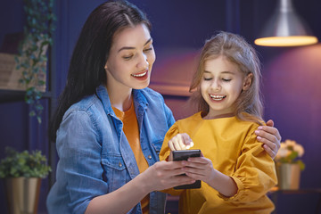 mother and daughter are playing