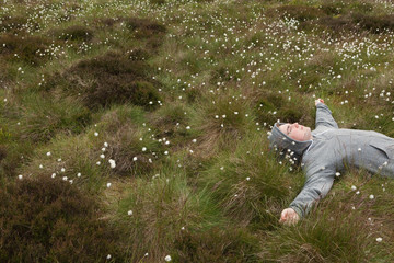 Man lying in field