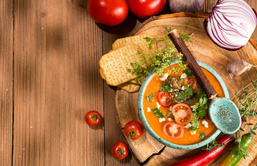 Cream puree soup from baked tomatoes, eggplants, pepper, red onion. Healthy vegetarian food.