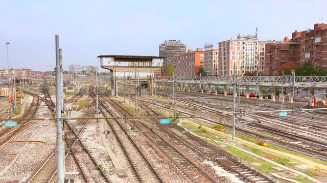 cinematic timelapse shot of railways of train station in Italy