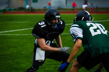 Football players offense defense in action 