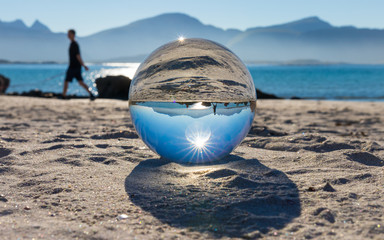 Fototapeta na wymiar Ramberg beach trough the glass ball
