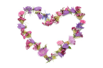 Fototapeta na wymiar figure in the form of heart isolated on a white background heart shaped figure lined with flower petals feelings and emotions Pink and purple flowers Flower petals in the pink range