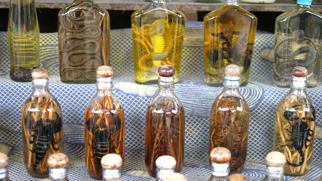 Lao Local Whiskey With Cobra Snakes and Scorpions. Closeup. HD, 1920x1080. 