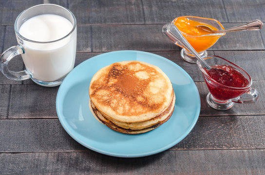 Small pancakes on a blue plate