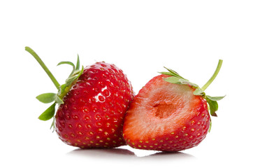  strawberries, whole one  another half,  isolated on white backgraund