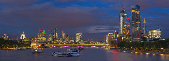 Fototapeta na wymiar London - The evening panorama of the City with the skyscrapers in the center.