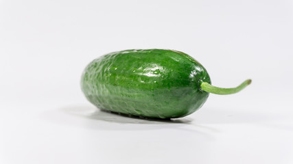 Green cucumber isolated on white background