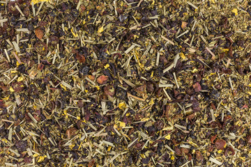 background of  herbal fruit tea with petals, dry berries mint and fruits