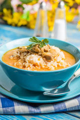 Tomato soup with rice.