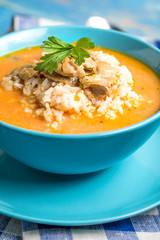 Tomato soup with rice.