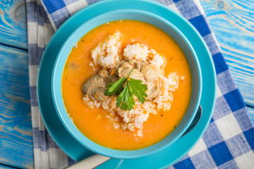 Tomato soup with rice.