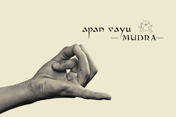 Apan vayu mudra. Yogic hand gesture. Isolated on toned background black and white. - obrazy, fototapety, plakaty