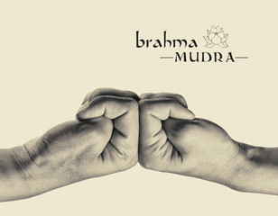 Brahma mudra. Yogic hand gesture. Isolated on toned background, black and white.