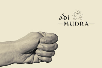 Adi mudra. Yogic hand gesture. Isolated on toned background black and white.