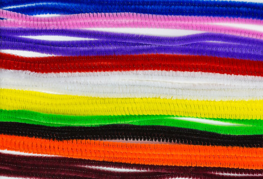 background of multicolored pipe cleaners