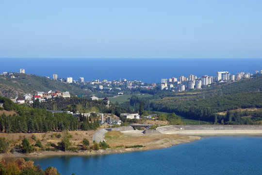 City in the mountains by the sea. Landscape.