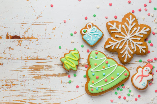 Christmas cookies on rustic wood background