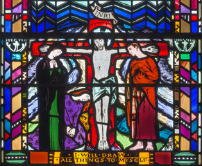 LONDON, GREAT BRITAIN - SEPTEMBER 16, 2017: The stained glass of Crucifixion in church St Etheldreda by Charles Blakeman (1953 - 1953).