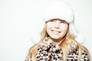 Joyful exciting girl ready for cold winter time on a light background, closeup portrait. Youth, love, happiness and excitement