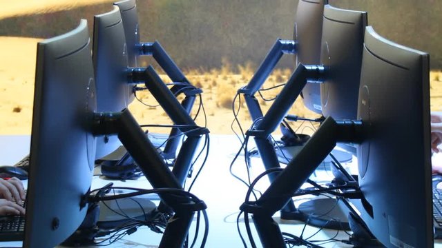 Modern work space with flat monitors
