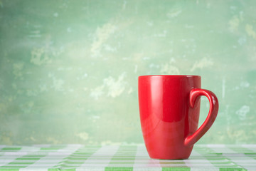 Red cup on the table