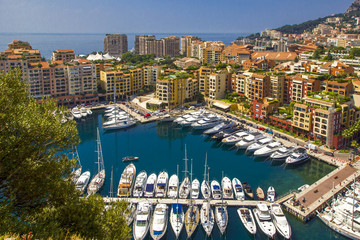 Harbor with boats and yachts pictured in principality of Monaco, southern France