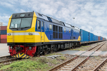 Fototapeta na wymiar Cargo train platform with freight train container at depot in port use for export logistics background.