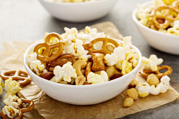 Homemade trail mix with popcorn, pretzels and nuts