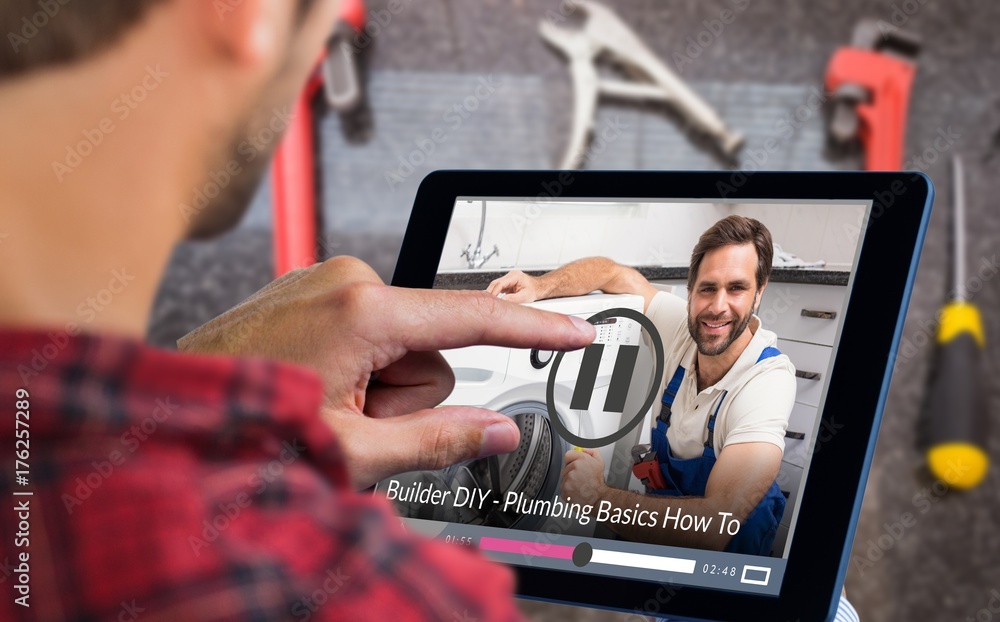 Aufkleber composite image of man using tablet