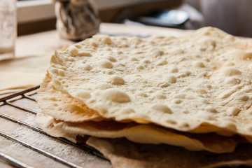 Cake layers on table covered with papercloth