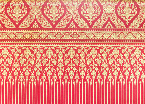 Traditional Thai Pattern On The Red Wallpaper.