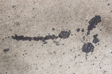 Cement surface with oil stain texture