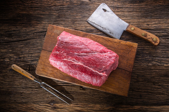 Beef Steak. Raw beef steak. Big Rib Eye steak on wooden board