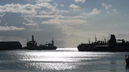 MAURITIUS, MAY 22, 2017. Cargo ships arriving at Port Louis, in Mauritius on May 22nd 2017. 